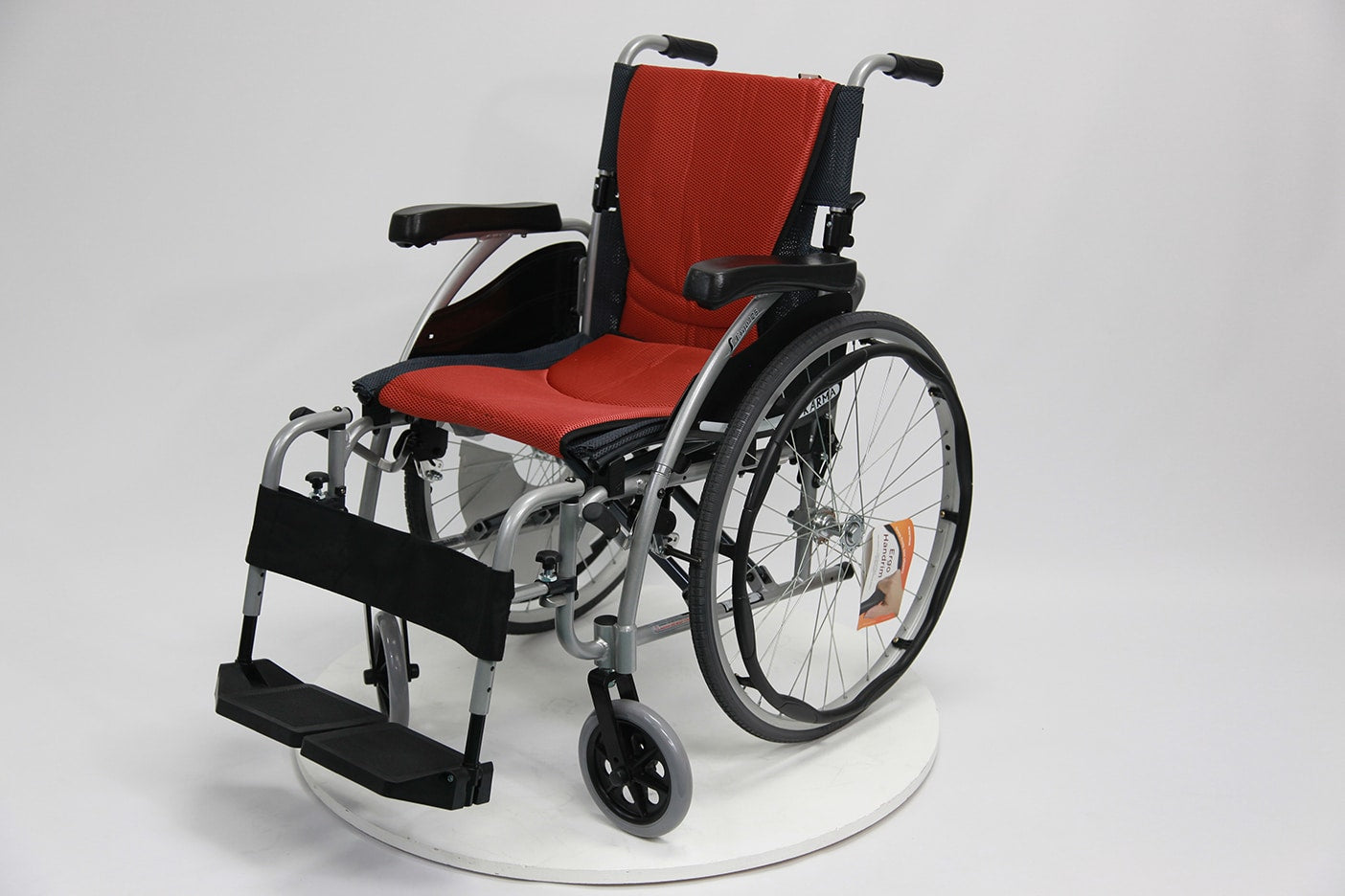 Flip back armrest Weighs under 25 lbs  Removable footrest